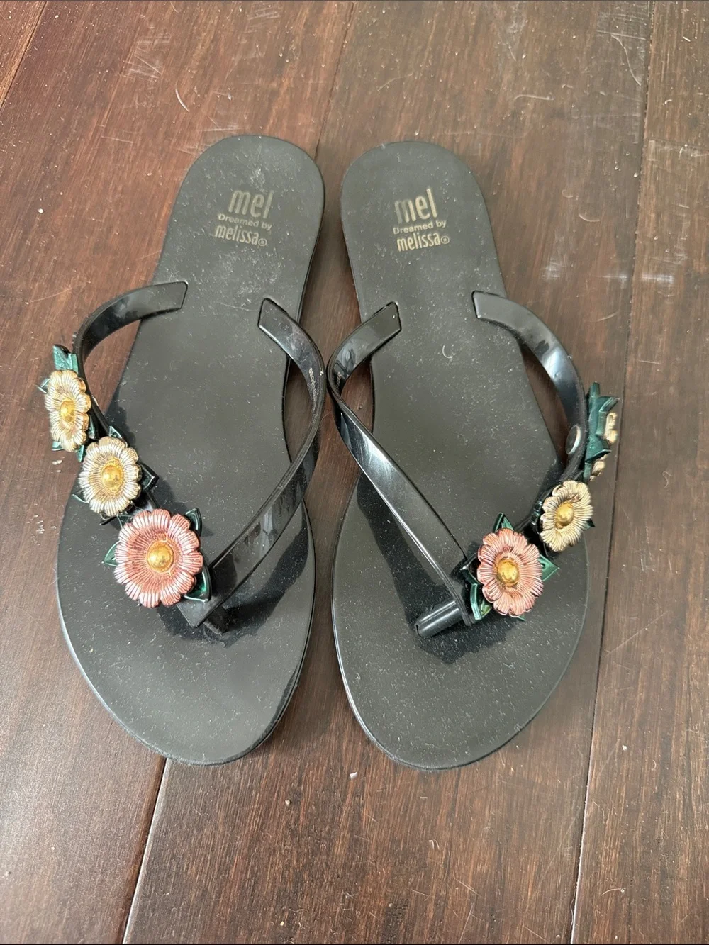Mel dreamed by Melissa Black Jelly Flip Flops with Pink & Cream Floral Accents